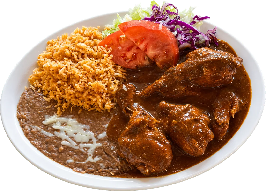 Chicken mole poblano with rice, beans and cabbage salad