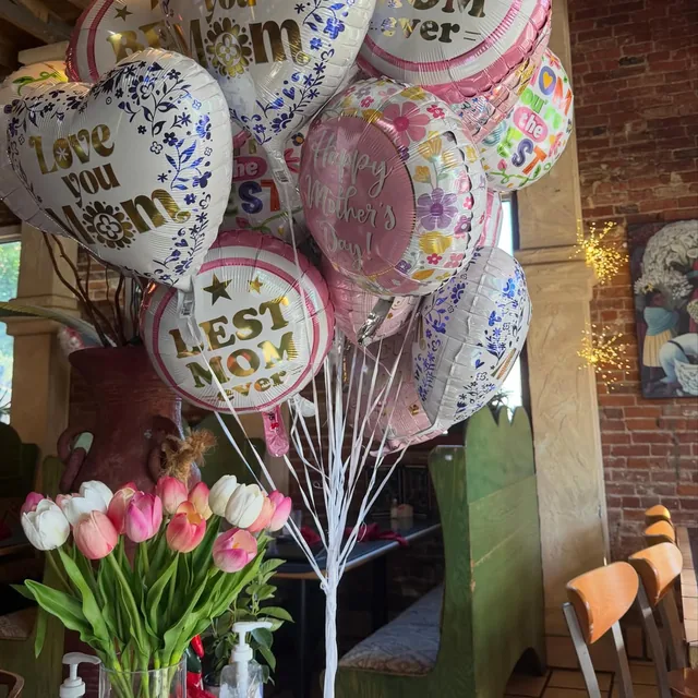 Mother's Day balloons and tulips inside the dining room