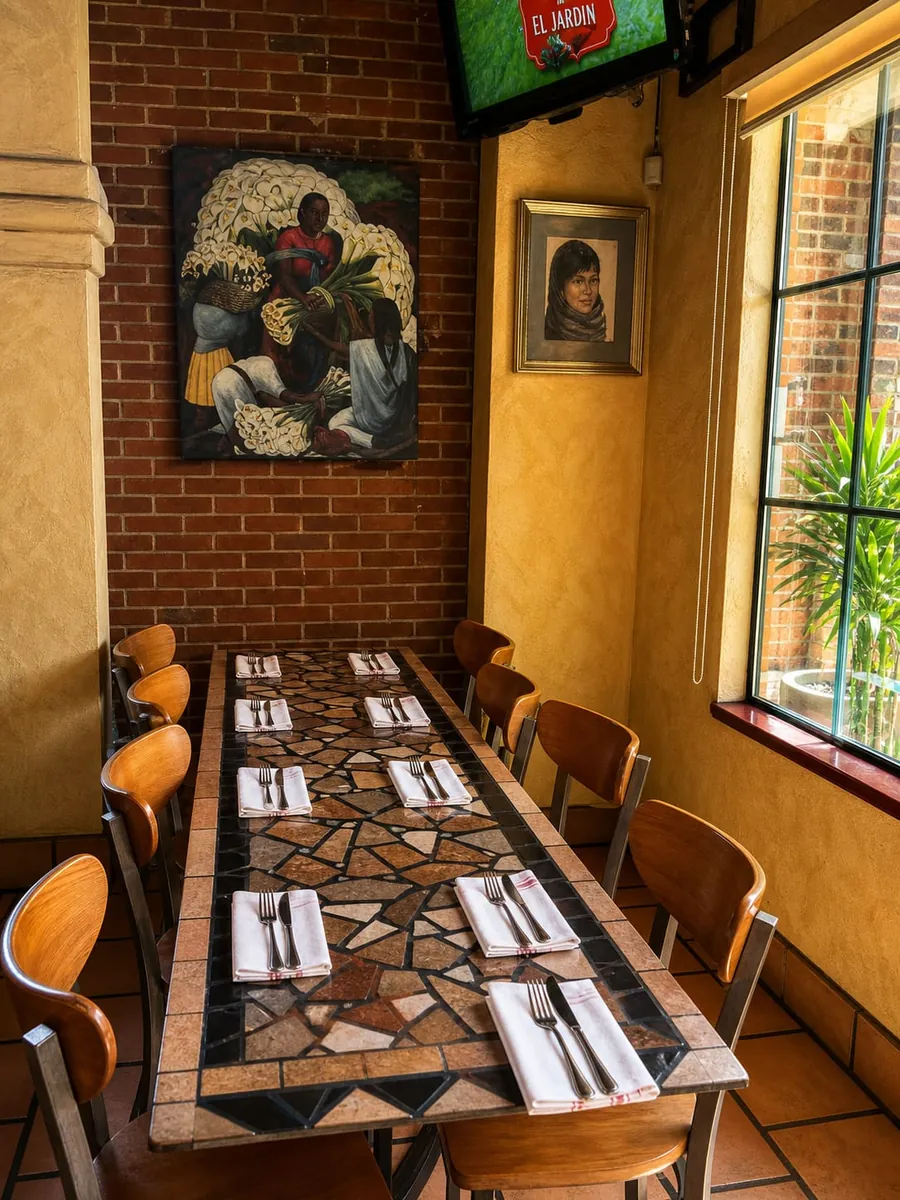 The long tiled table under the flower-seller painting, set for a party